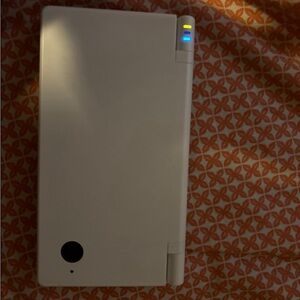 Completely Japanese Nintendo DSi (comes with a game and the charger, no stylus)